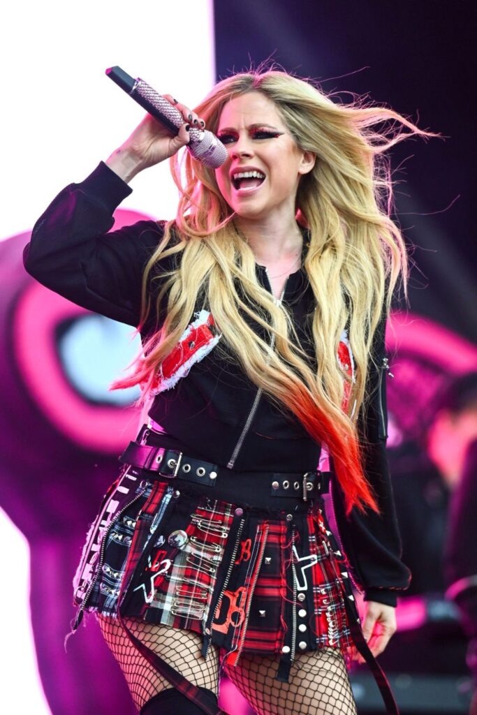 Avril Lavigne performing at Glastonbury.